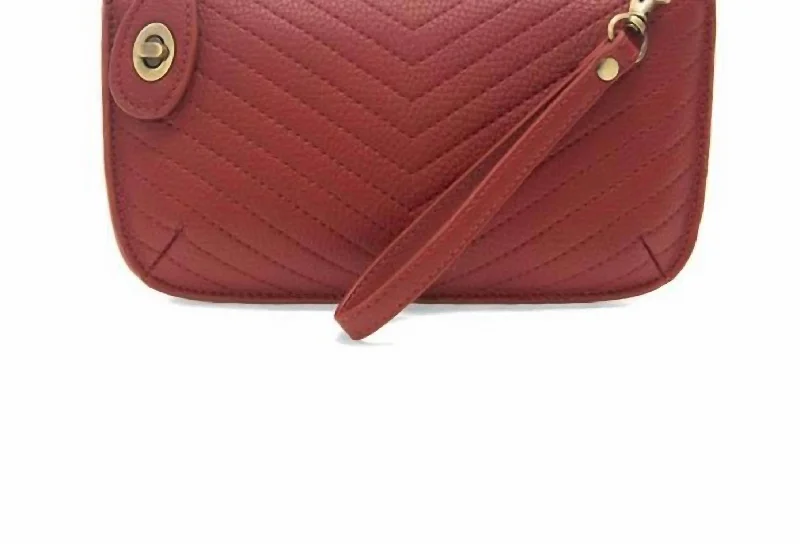 Elegant women's bags with woven texture and metallic chain strap for sophisticated look-Mini Crossbody Wristlet In Garnet Quilted