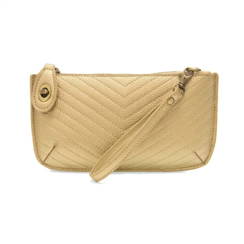 Women's bags with chic, structured design and textured leather for added flair-Mini Crossbody Wristlet In Gold Quilted