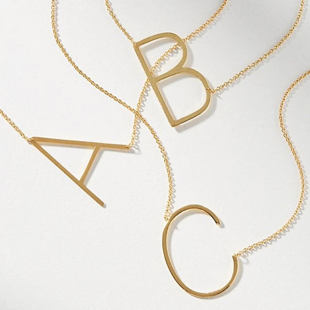 Trendy necklaces and pendants with statement pieces for a bold fashion statement-CAI Sideways Initial Necklace