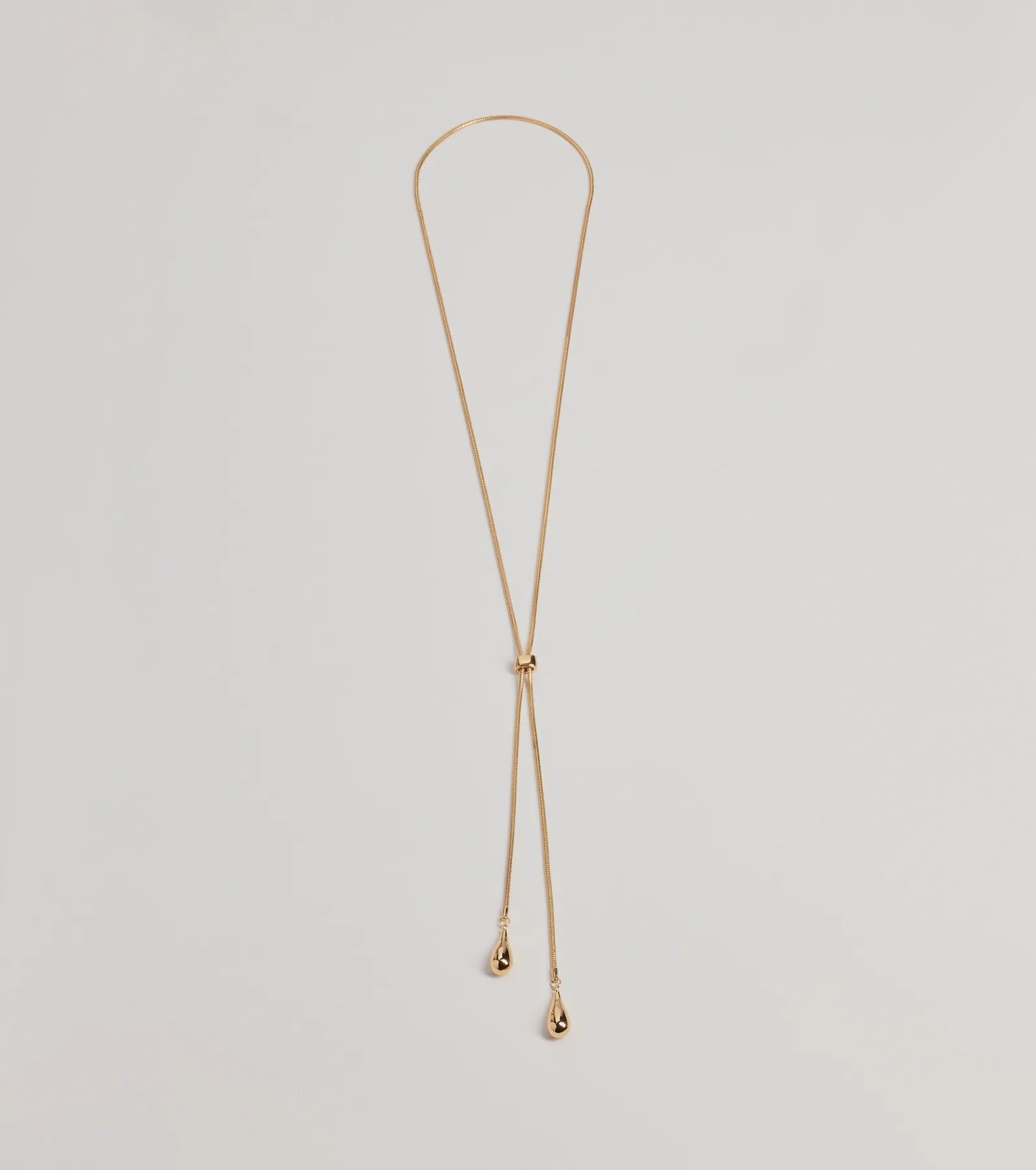 Best necklaces and pendants with vintage lockets for a nostalgic, sentimental look-Sleek Teardrop Charm Lariat Necklace