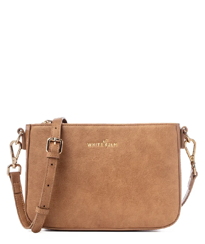 Fashion-forward women's bags with metallic finishes and sleek, modern design-Ara Convertible Crossbody Clutch - Almond